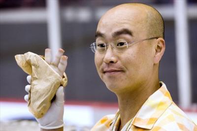 Vince Masuka Holding Up Evidence