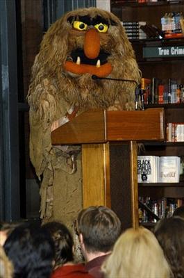 Muppet blending seamlessly into APA crowd