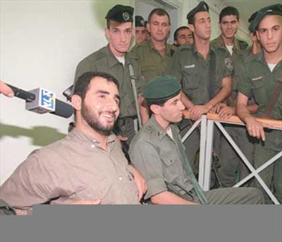 brave palestinin smiling at coward zionst 