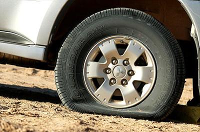a flat car tyre for when you are stuck on the motorway