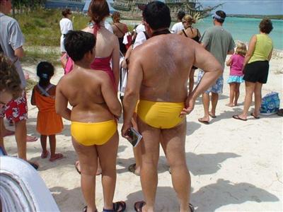A man in yellow Speedos
