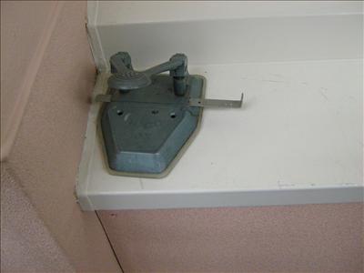 Abandoned Two-Hole Punch