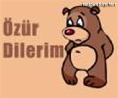 özürr