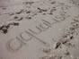 Written in the sand photo by Stefanie Voigt