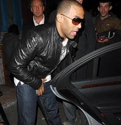 the C*NT that wears shades at night....yes in a nightclub! 