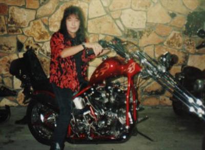 Ace on a Harley