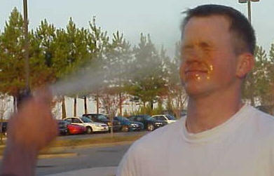 friendly spray of mace in the face