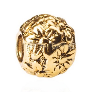 Guldcharm med blomster
