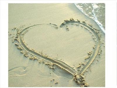 Lovely Heart in Sea Sand