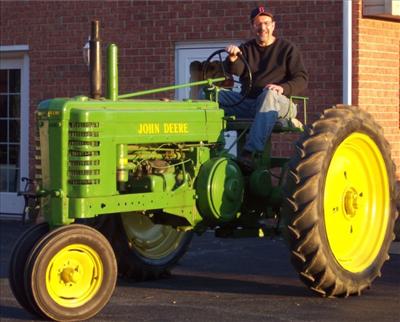 angry boy on tractor