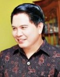 Drs. JOHNY RUNTUWENE